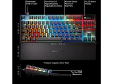 Charger l&#39;image dans la galerie, Un clavier avec repose-poignets et étiquettes. Il possède des touches multicolores et un écran OLED.
