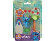 Ensemble de jouets Stitch Disney en blister. Comprend une figurine Stitch, une planche de surf et un palmier.