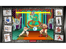 Charger l&#39;image dans la galerie, Un écran de jeu vidéo avec deux personnages qui se battent et le logo Capcom.
