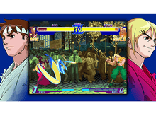 Charger l&#39;image dans la galerie, Écran de jeu de combat. Deux personnages au milieu, avec deux portraits de personnages sur les côtés.
