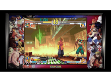 Charger l&#39;image dans la galerie, Une capture d&#39;écran d&#39;un jeu de combat. Deux personnages se battent dans une scène de rue.
