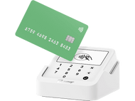 Carte de crédit verte au-dessus d'un terminal de paiement blanc. Terminal avec écran et boutons.