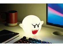 Charger l&#39;image dans la galerie, Une lampe blanche en forme de fantôme avec une bouche rouge est sur un bureau.
