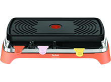 Charger l&#39;image dans la galerie, Un appareil à raclette avec un dessus noir et une base orange, avec des poignées roses, jaunes et rouges.
