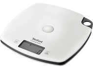 Balance de cuisine Tefal Compliss blanche avec affichage numérique et bord noir, sur fond noir.