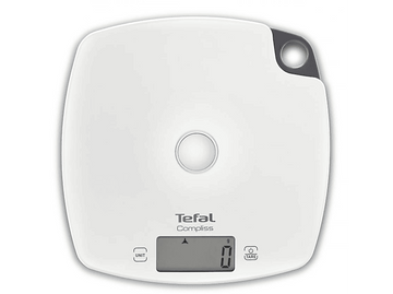 Balance de cuisine blanche. L'écran numérique affiche zéro. La marque est Tefal, Compliss.