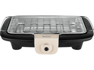 Gril électrique Tefal avec une base noire, une grille en acier inoxydable et un panneau de commande crème.