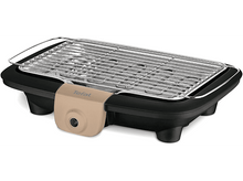 Charger l&#39;image dans la galerie, Un grill électrique avec une base noire, un panneau de commande beige et une surface de cuisson argentée.
