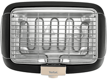 Charger l&#39;image dans la galerie, Gril Tefal noir avec intérieur argenté, vue de dessus, fond noir et blanc.
