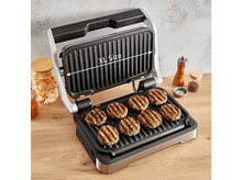 Charger l&#39;image dans la galerie, Gril de taille XL avec des burgers cuits. Fond de table en bois avec un bocal et une salière.
