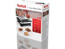 Charger l&#39;image dans la galerie, Tefal Inizio Adjust Grill dans sa boîte. La boîte montre des images d&#39;aliments en cours de cuisson.
