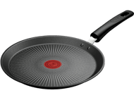 Une poêle noire avec une poignée noire et un cercle rouge au centre.