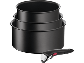 Casseroles noires empilées avec une poignée détachée.