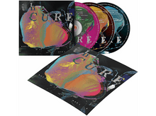 Charger l&#39;image dans la galerie, Pochette d&#39;album et trois CD, avec un design abstrait coloré et le mot &#39;CURE&#39;.

