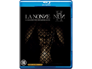 Couverture Blu-ray du film 'La Nonne II'. Présente le visage d'une nonne derrière un treillis.