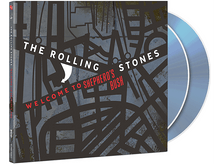 Charger l'image dans la galerie, Le coffret CD des Rolling Stones. La couverture montre un motif de carte et les CD sont visibles.
