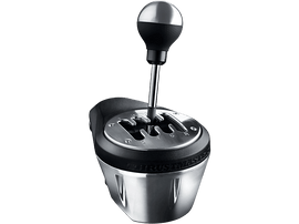 Levier de vitesses argenté et noir sur fond noir.