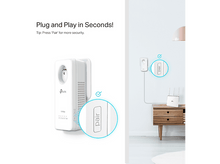 Charger l&#39;image dans la galerie, Un appareil TP-Link blanc branché au mur. Le texte indique &#39;Pair&#39; pour la sécurité. Un autre appareil et un routeur sur une armoire en bois.
