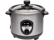 Un cuiseur à riz en acier inoxydable avec un couvercle en verre. Le logo Tristar est visible.