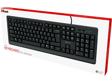 Charger l&#39;image dans la galerie, Clavier noir sur boîte blanche. Touches avec lettres, chiffres et symboles. Marque &#39;Trust&#39;.
