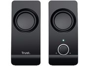 Deux enceintes Trust noires. L'une a un bouton de volume et l'autre un bouton d'alimentation et une lumière verte.