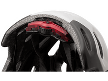 Charger l'image dans la galerie, Gros plan d'un casque blanc et noir avec une lumière rouge.
