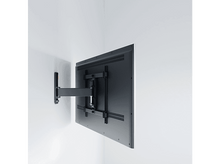 Charger l&#39;image dans la galerie, Un téléviseur monté sur un mur, avec un support et un dos noirs, sur un mur blanc.
