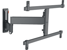 Support mural TV articulé gris foncé. Il a des bras et des articulations pour un positionnement polyvalent.