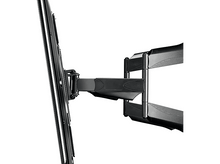 Charger l&#39;image dans la galerie, Un support TV noir avec un bras articulé, monté sur un mur. Le téléviseur est fixé au support.
