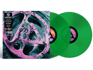 Un vinyle de Linkin Park. La couverture de l'album présente un design abstrait. Deux vinyles verts sont visibles à droite.