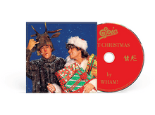 Charger l'image dans la galerie, Pochette d'album avec deux hommes en costumes de Noël. Un CD à côté.
