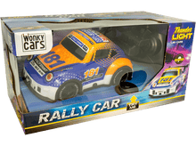 Charger l&#39;image dans la galerie, Voiture de rallye jouet dans une boîte. La voiture est bleue et orange, étiquetée &quot;181&quot;. La boîte contient du texte.
