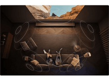 Charger l&#39;image dans la galerie, Deux personnes sur un canapé regardent un paysage projeté au plafond.
