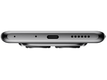 Charger l&#39;image dans la galerie, Vue de dessous d&#39;un smartphone sombre.
