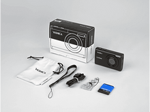 Charger l&#39;image dans la galerie, Une boîte de caméra Yashica digimate, caméra, sac, sangle, câble et batterie sur une surface blanche.
